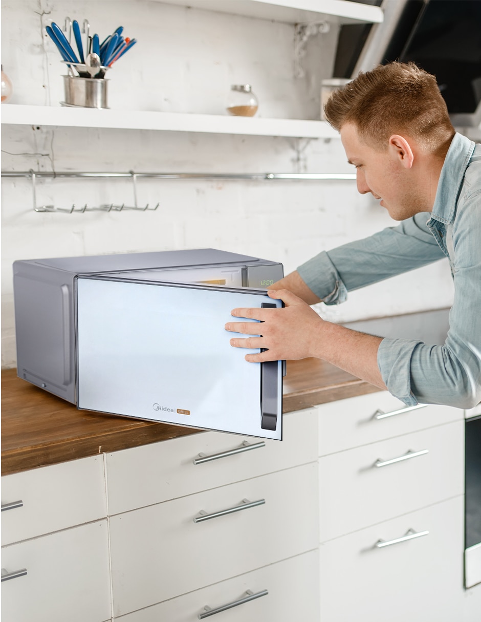 Horno de microondas con grill modelo MMDXG11S2MG de 1.1 pies cúbicos 4