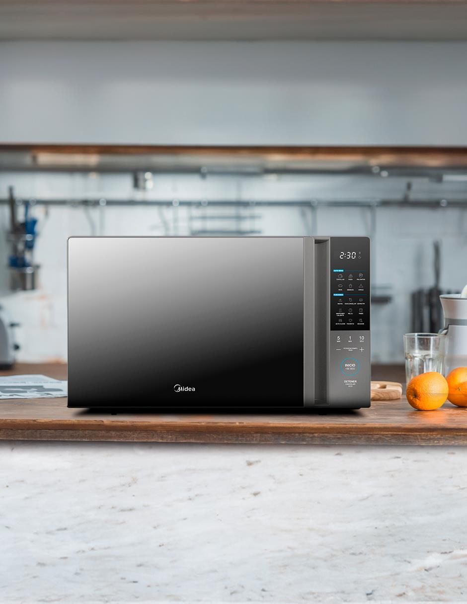 Horno de microondas convencional modelo MMDT11S2MG de 1.1 pies cúbicos 2